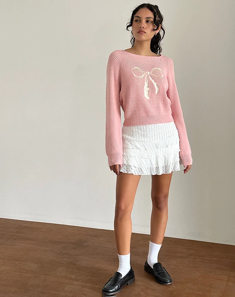 Pull Tami en tricot rose avec broderie de nœuds blancs