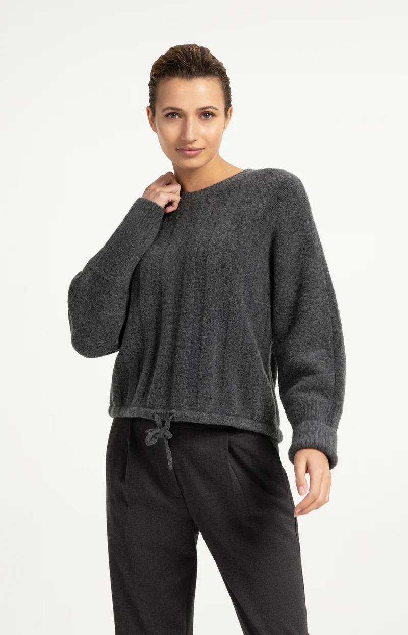 Pull ample à ourlet ajustable
