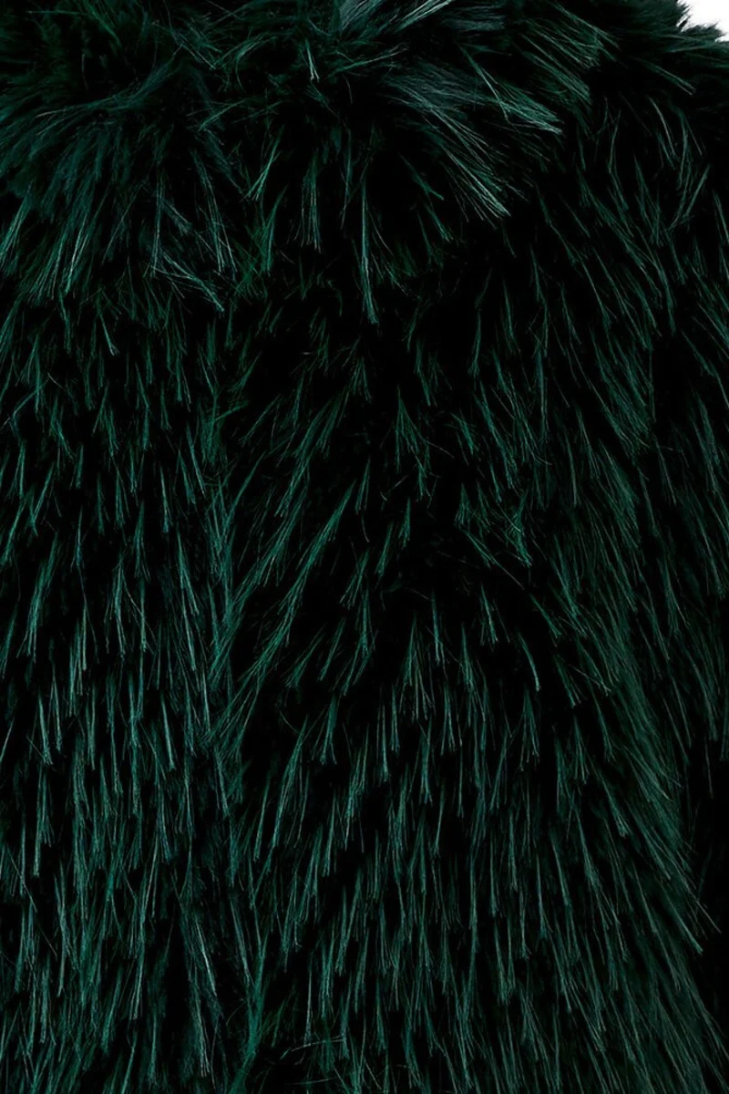 Manteau court à effet fourrure