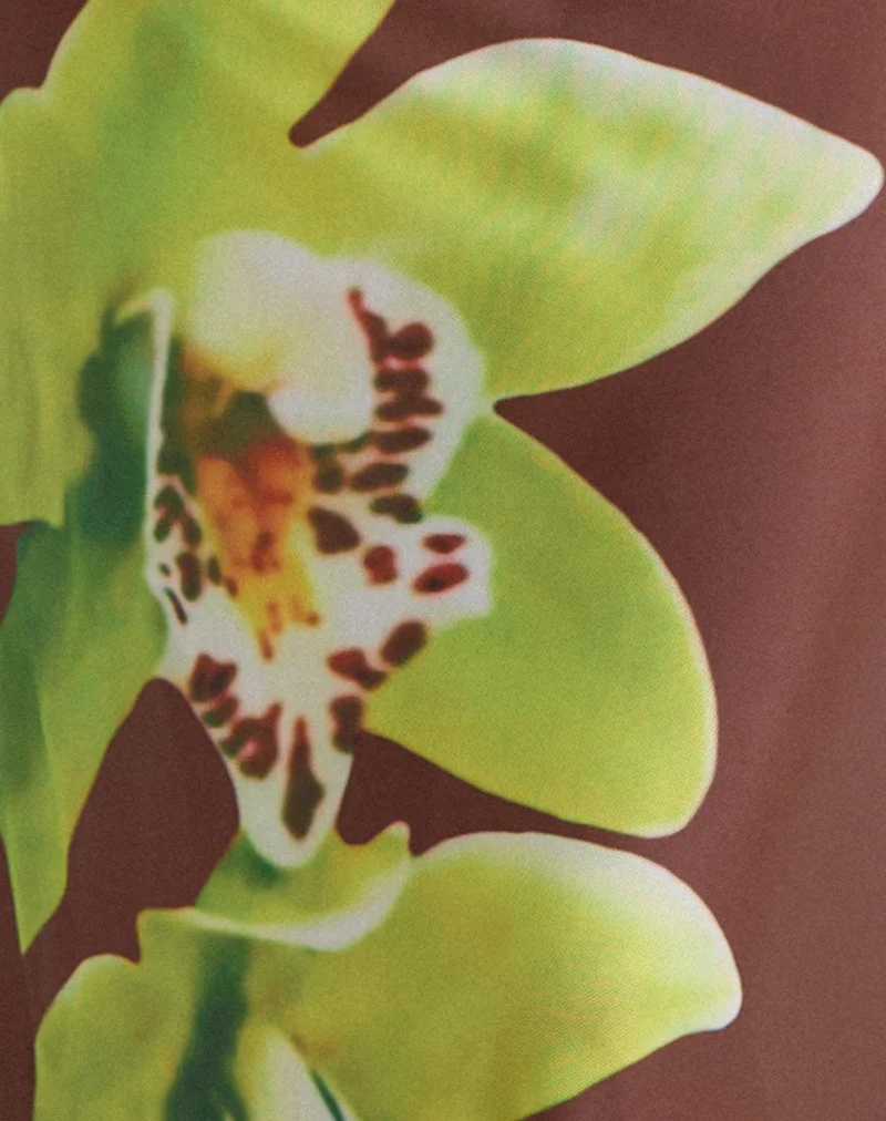 Jupe longue Dartina de couleur marron ornée d'une fleur de dendrobium verte