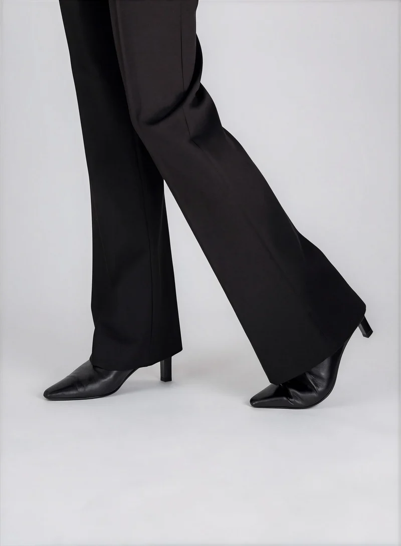 Pantalon taille haute à jambe évasée Suzie