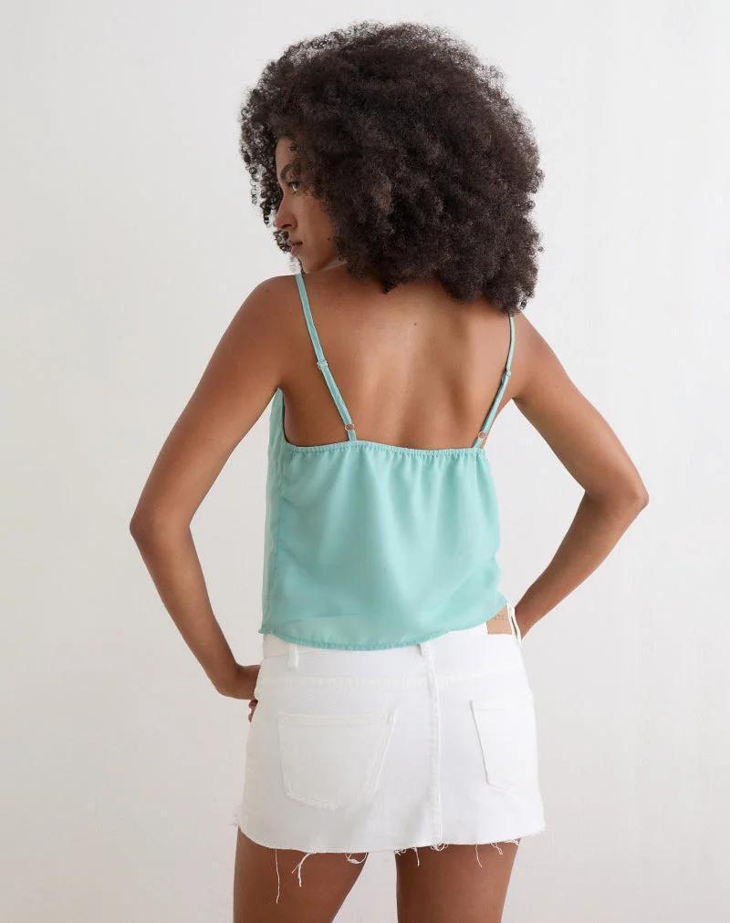 Haut Tavina en mousseline à motifs floraux et paillettes, couleur turquoise