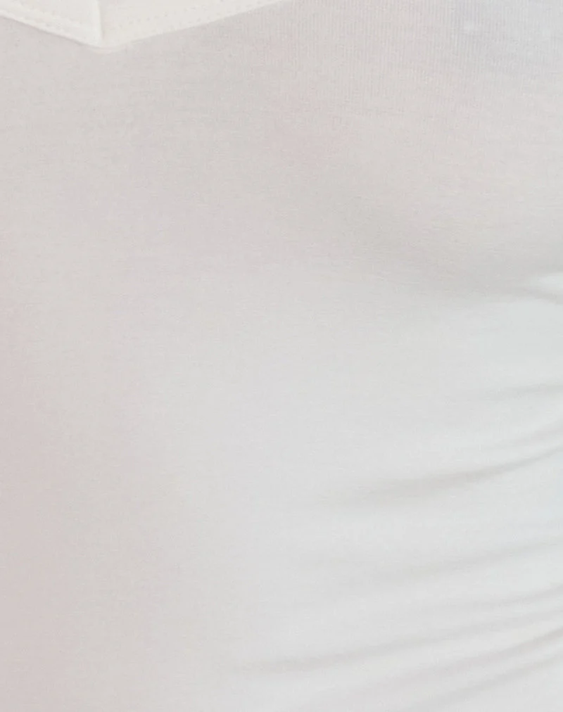 Jugo Halterneck Top in Ivory with Eyelets (Top dos nu en ivoire avec œillets)