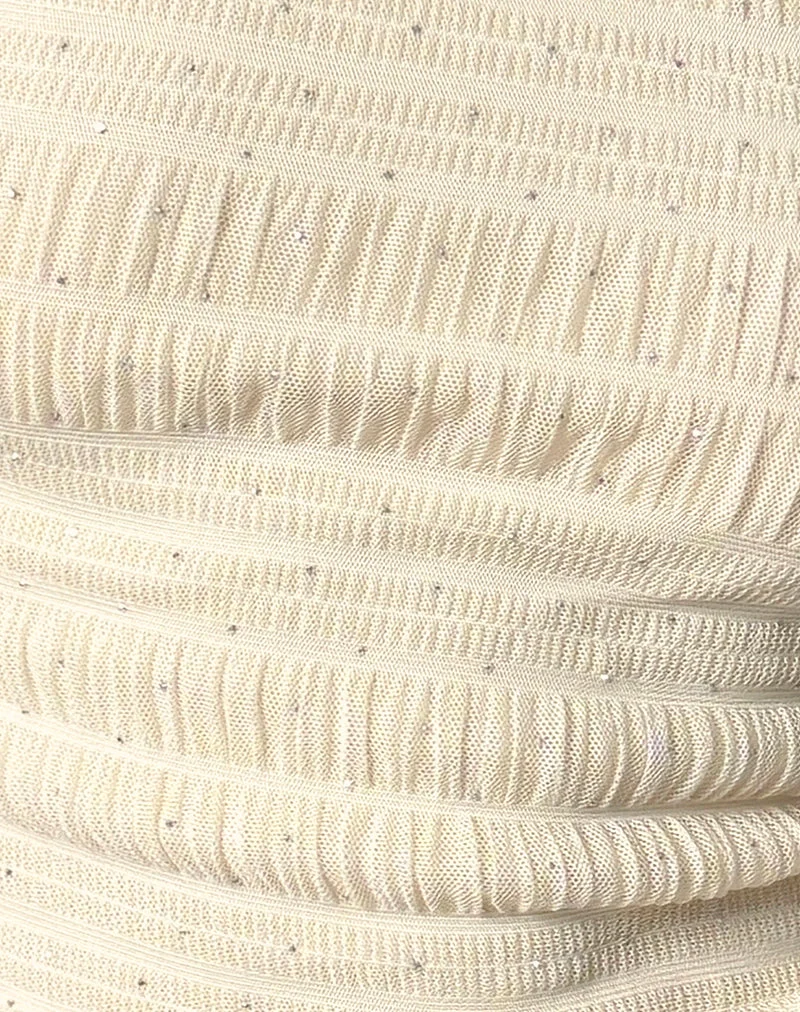 Top asymétrique Tamia en maille pailletée ivoire