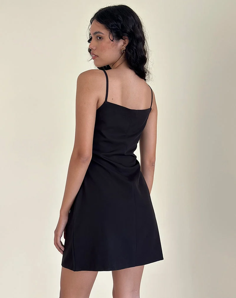 Mini robe Asinel en noir avec nœud en ivoire