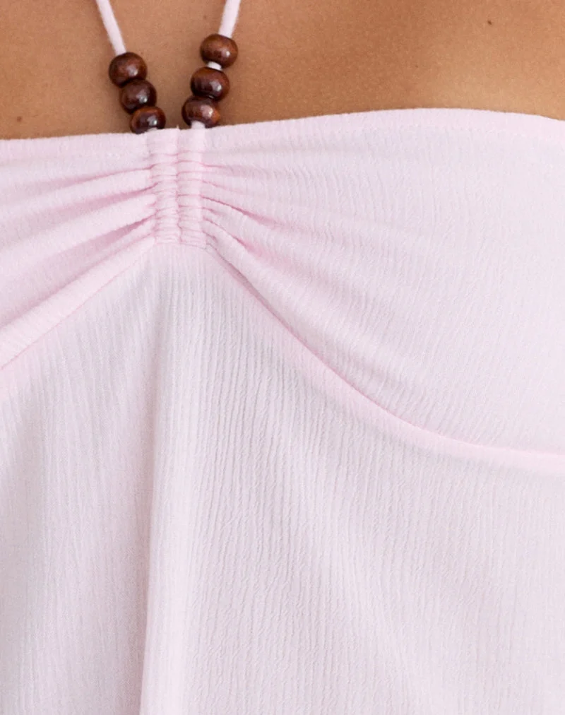 Haut « Grain Top » rose pâle froissé avec des perles