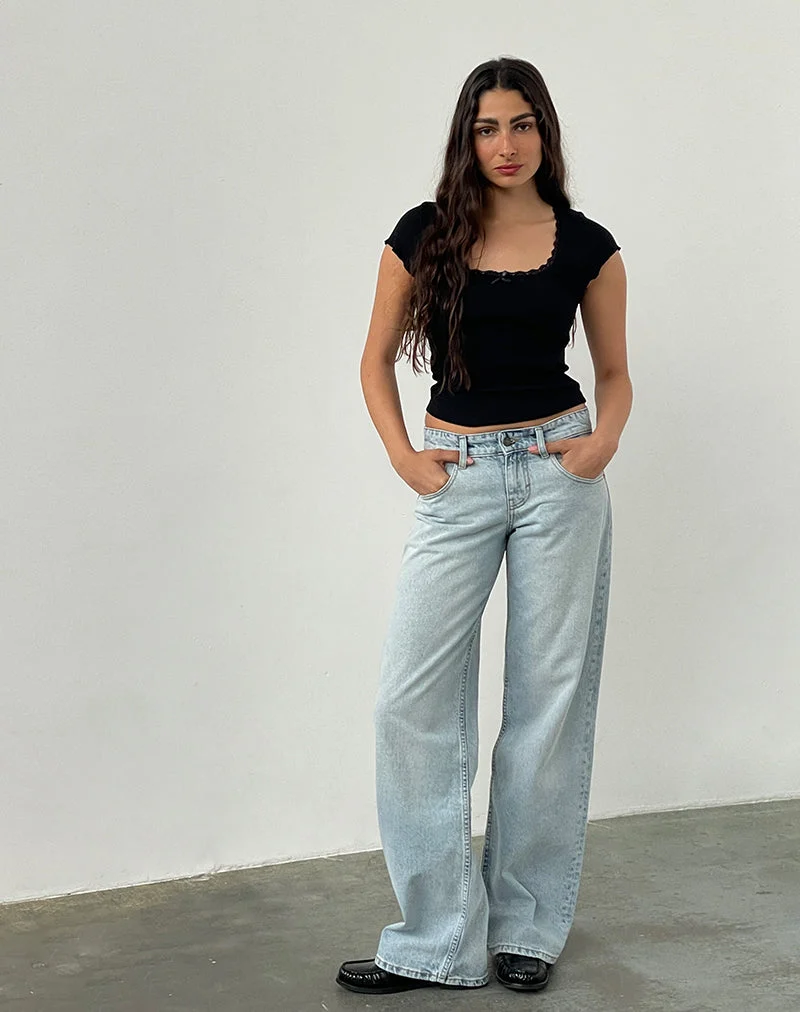 Jean parallèle taille basse, délavage extrême bleu clair