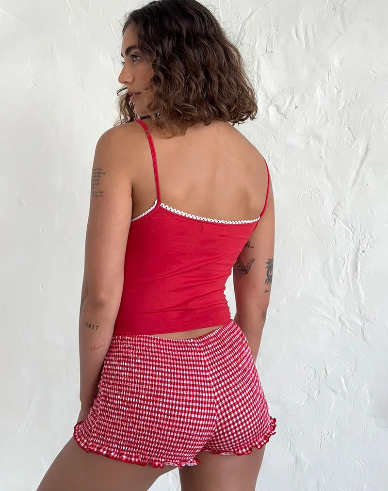 Top de gilet Suna en rouge tango avec bordure ivoire