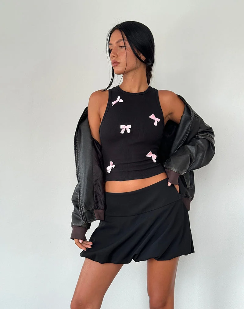 Gilet Rave noir avec nœuds roses