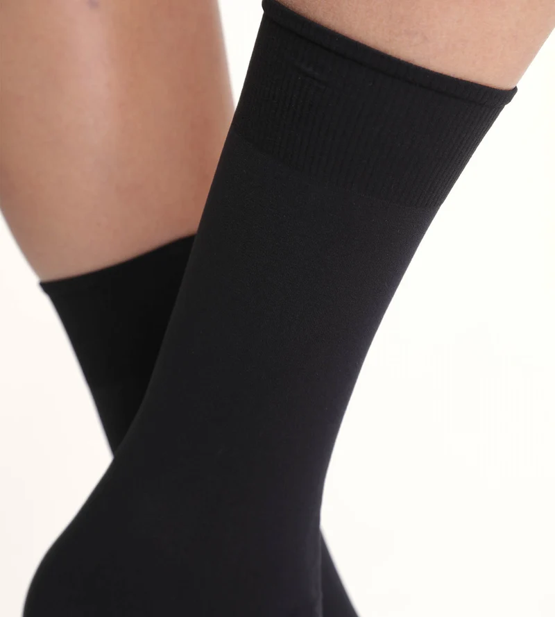 Mi-bas noirs Thermo Isole du froid 54D