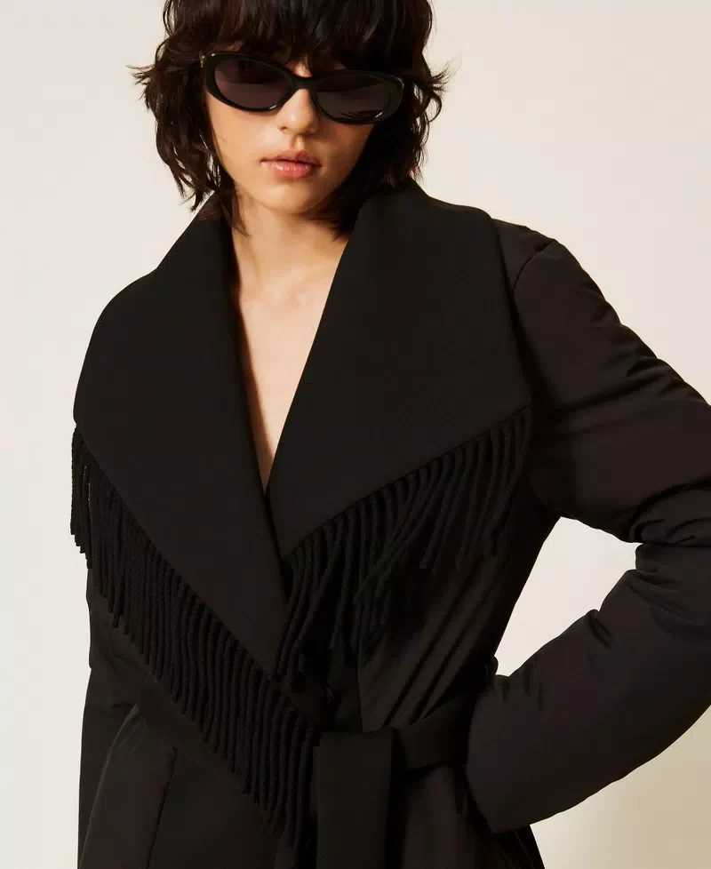 Manteau matelassé ceinturé à franges