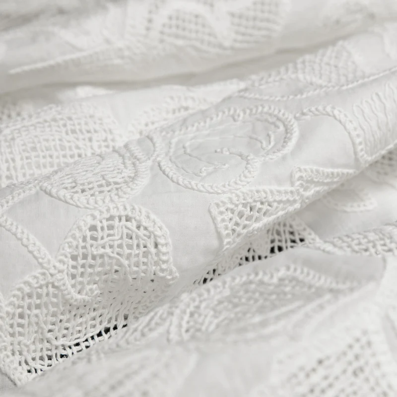Coton brodé ajouré à motifs de cœurs | Blanc | Deadstock de fabricant de luxe