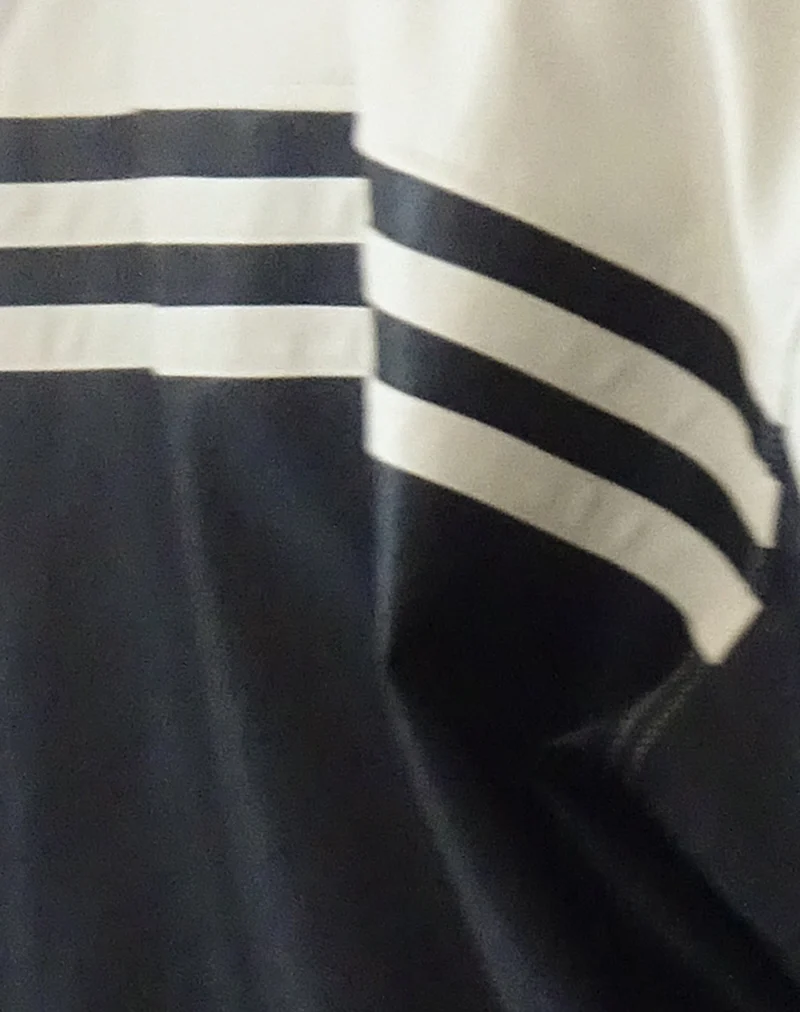 Veste Calista en PU noir et ivoire