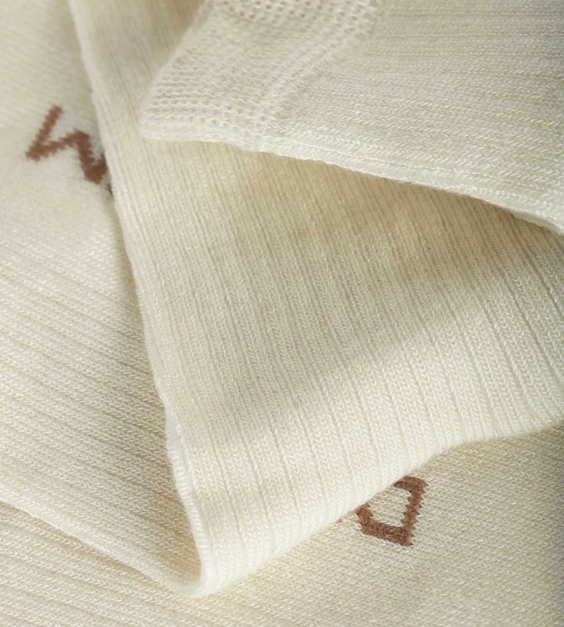 Chaussettes haute côtelée en coton Ivoire Dim Modal