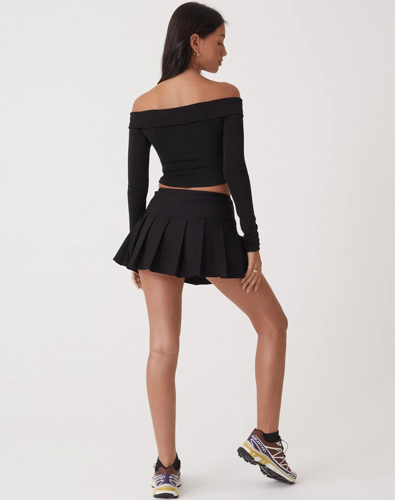 Jupe micro plissée Casini, tailleur noir