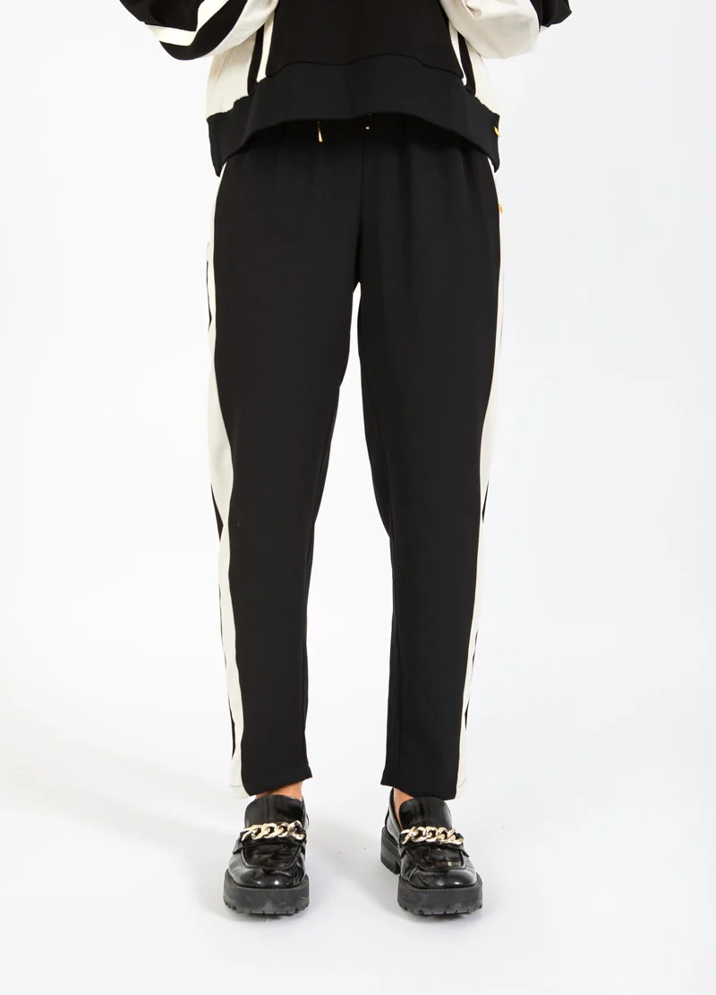 Jogging style sportif avec bandes latérales
