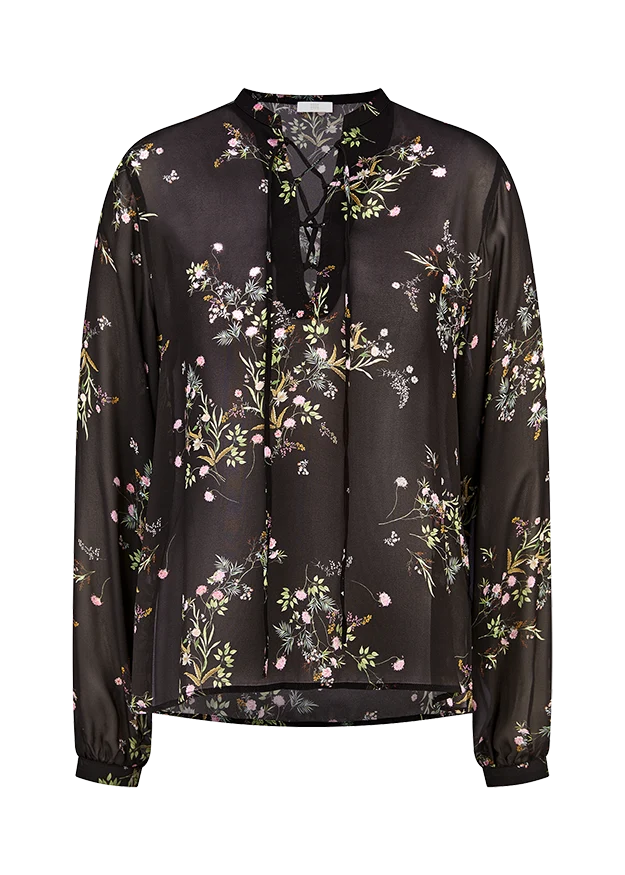 Blouse fleurie vaporeuse à col lacé