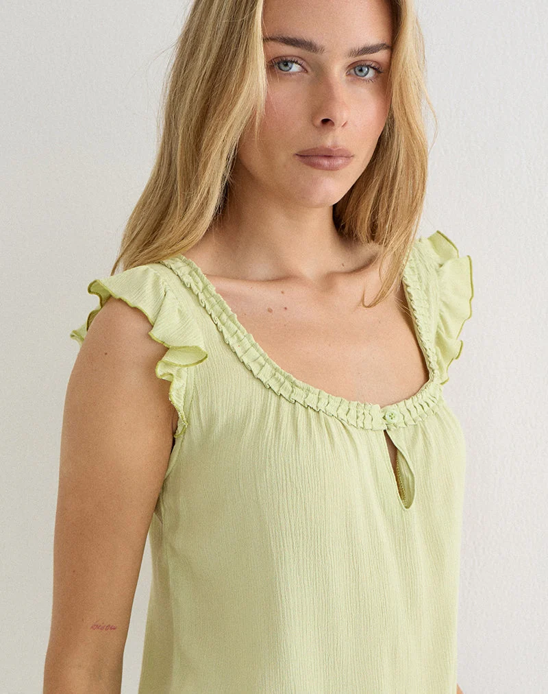 Haut Merisso à encolure rond et découpe en forme de trou de serrure, couleur pistache froissée