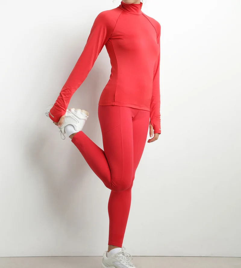 Haut de sport femme à col montant en microfibre Rouge Dim Move