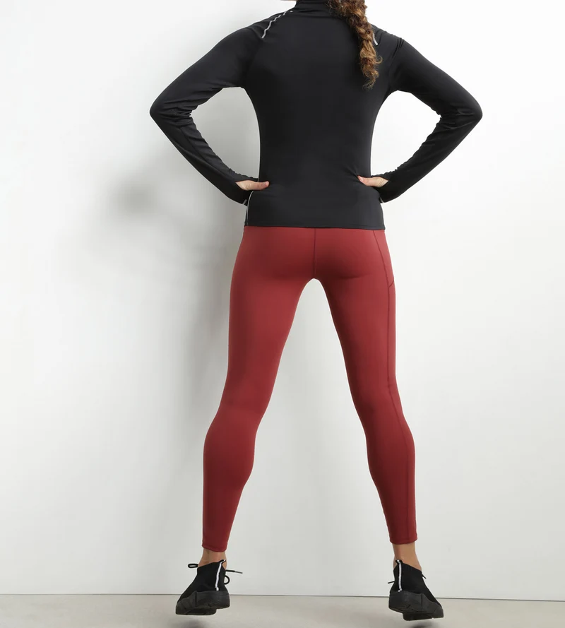 Haut de sport femme à col montant en microfibre noire Dim Move