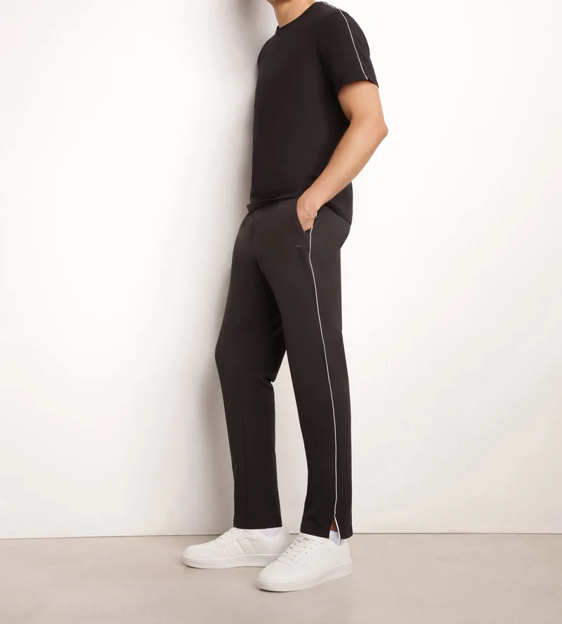 Pantalon de sport chino pour homme en jersey stretch Noir Dim Move