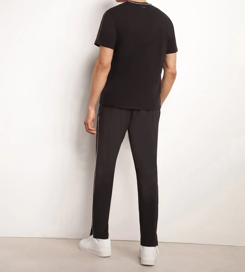 Pantalon de sport chino pour homme en jersey stretch Noir Dim Move