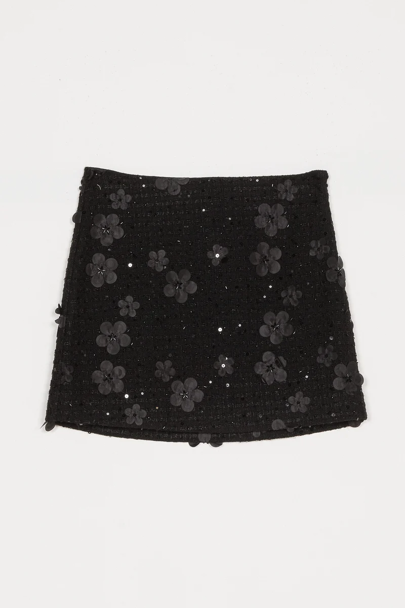 Ensemble de veston et jupe courte en bouclé