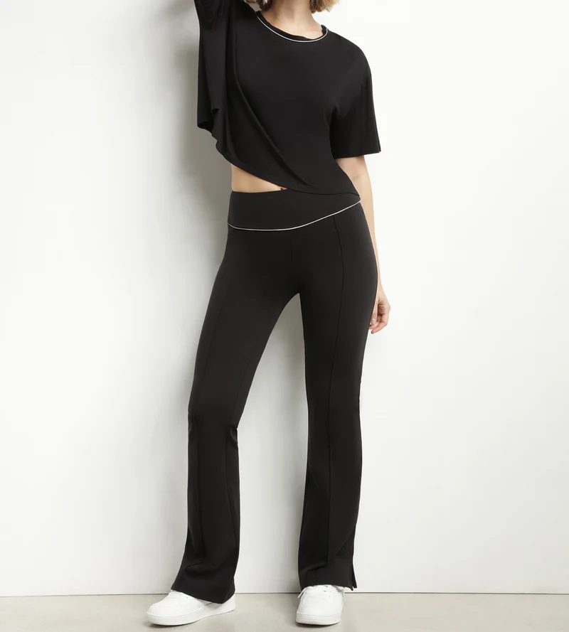 T-shirt de sport femme en viscose noire avec dos ouvert Dim Move