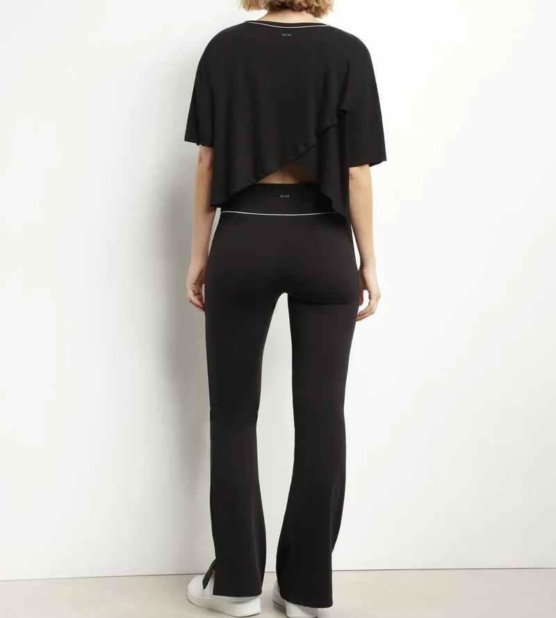 T-shirt de sport femme en viscose noire avec dos ouvert Dim Move