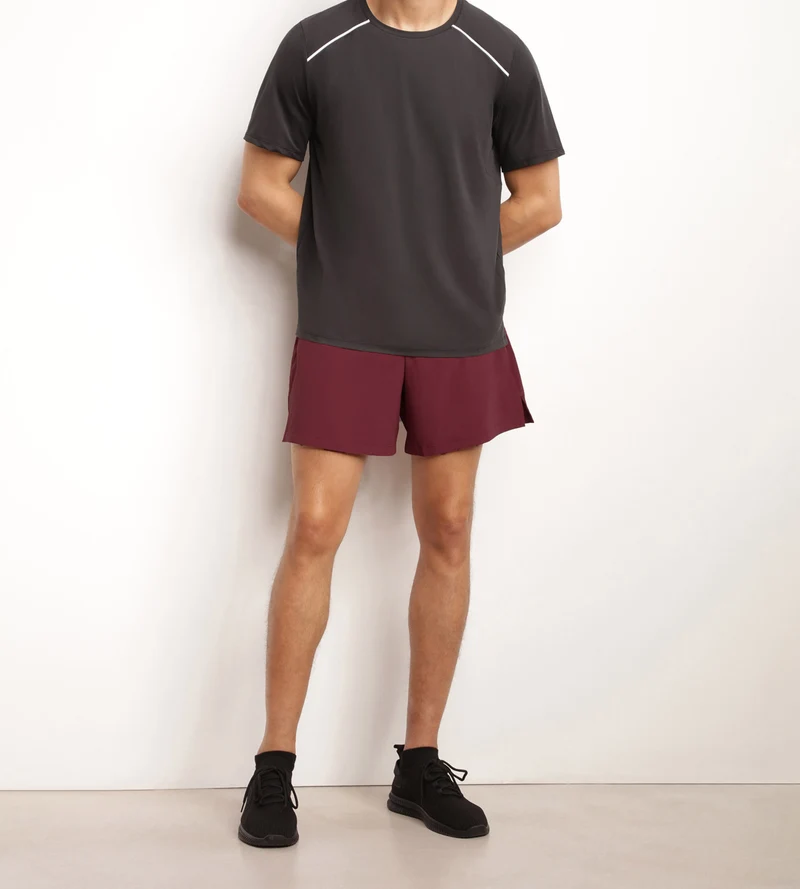 Short de sport homme en matière aérée Bordeaux Dim Move