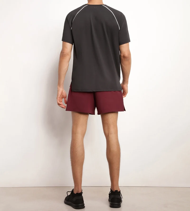 Short de sport homme en matière aérée Bordeaux Dim Move