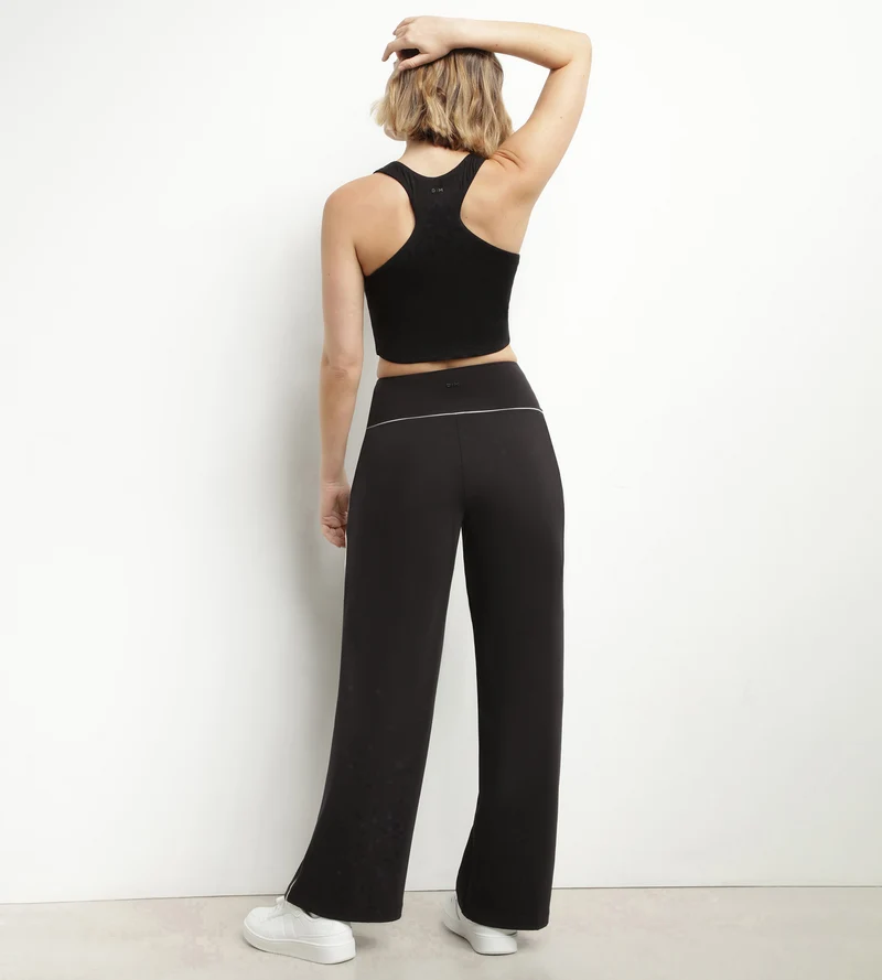 Débardeur de sport femme en viscose noire avec brassière Dim Move