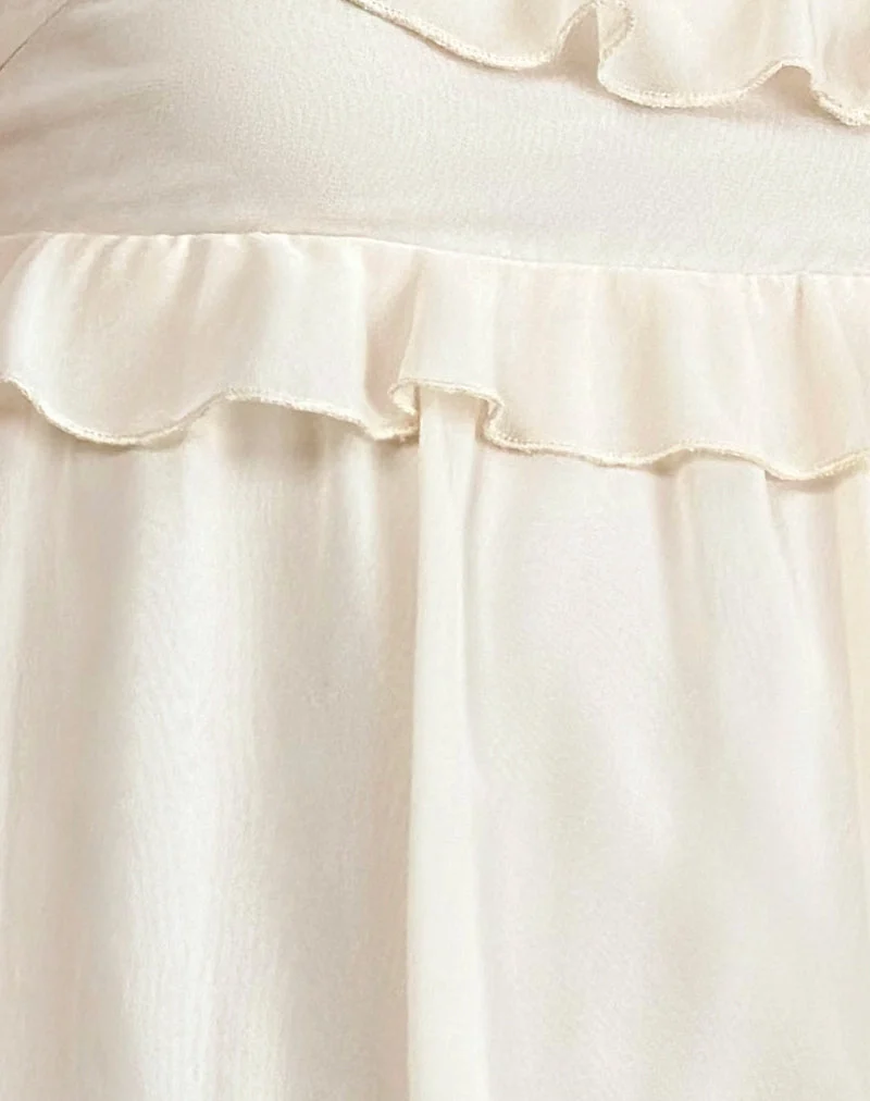 Garistha Babydoll Puffball Mini Dress in Cream