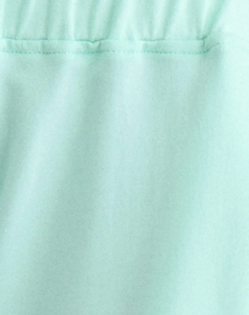 Pantalon capri Wamino couleur aqua à rayures blanches