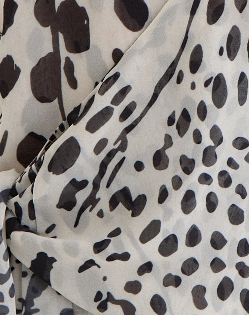 Haut à encolure dos nu Lilita, motif « peau de dalmatien » noir et ivoire
