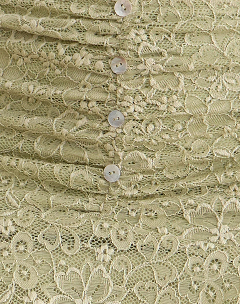 Jupe midi Sahara en dentelle extensible couleur sauge, avec boutons en perle