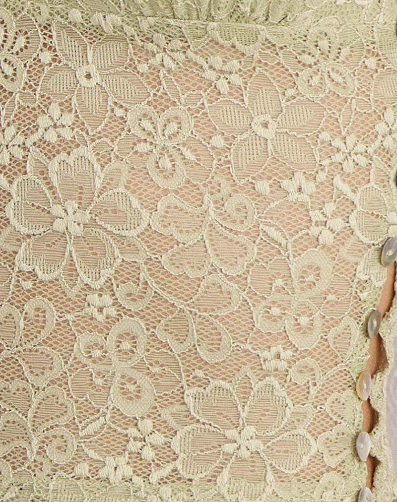 Haut Calora en dentelle extensible couleur sauge avec bouton en perle