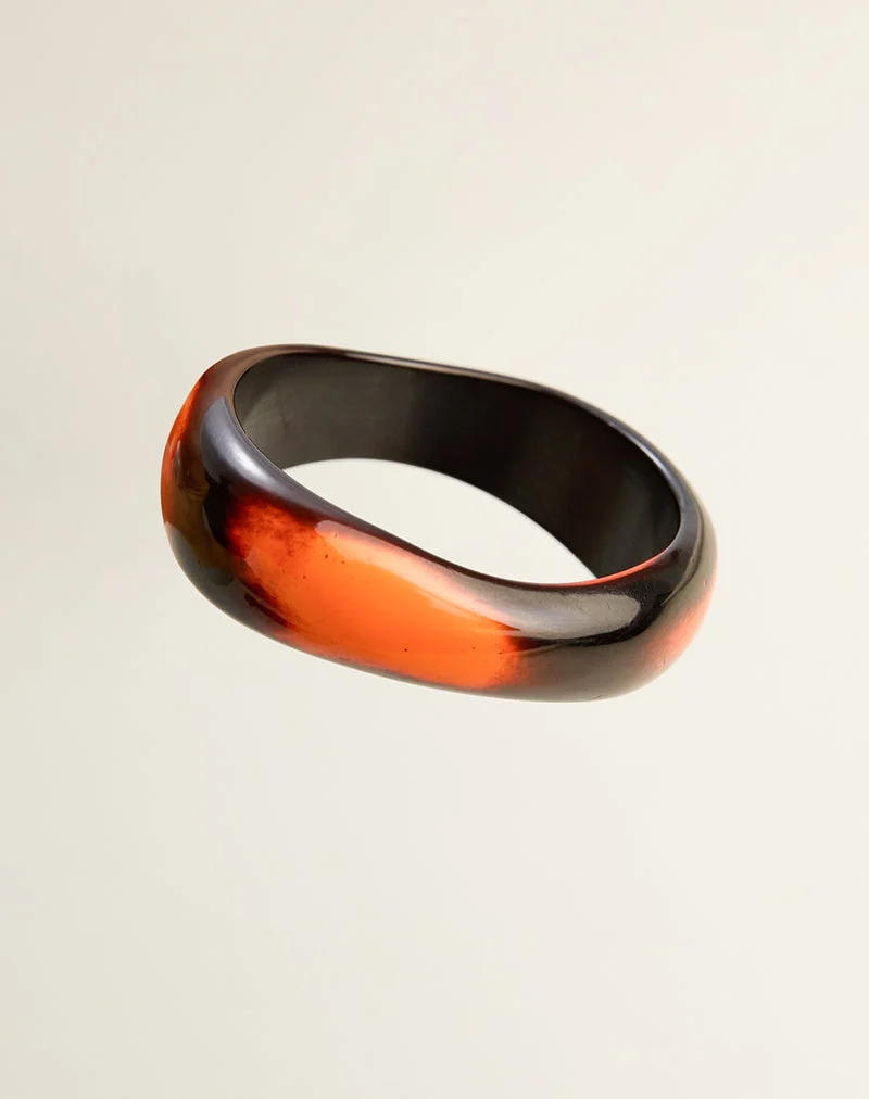 Bracelet rigide en bois noir et orange