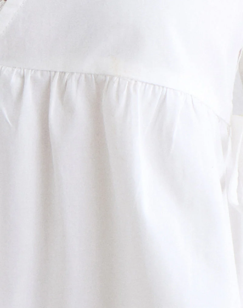 Blouse Fahwa à nouer sur les côtés, en popeline blanche