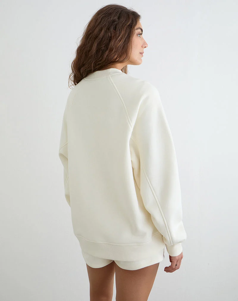 Pull Jorai, couleur « Winter White », avec broderie « M » ton sur ton