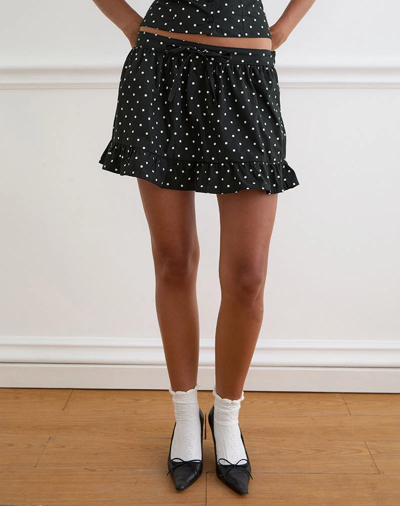 Mini-jupe Yasumi à pois noirs unis