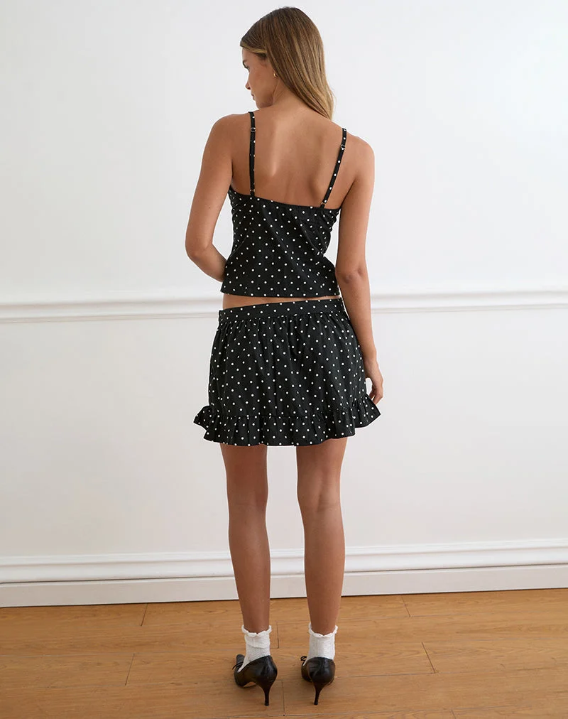 Mini-jupe Yasumi à pois noirs unis
