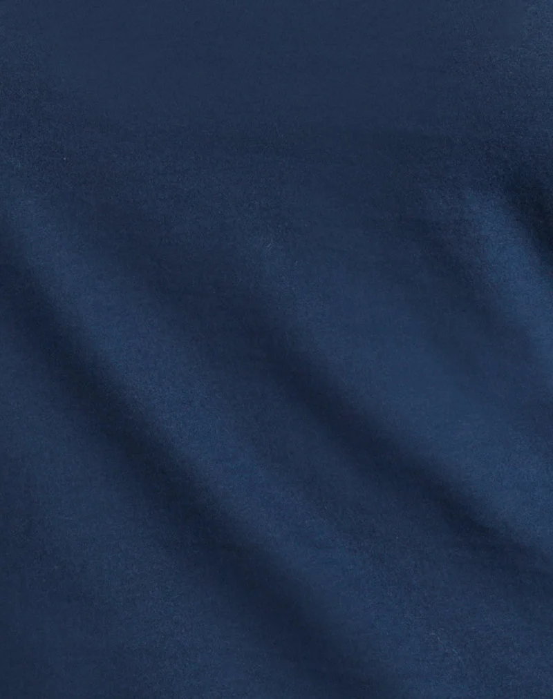 Haut asymétrique boutonné en jersey fin bleu marine foncé