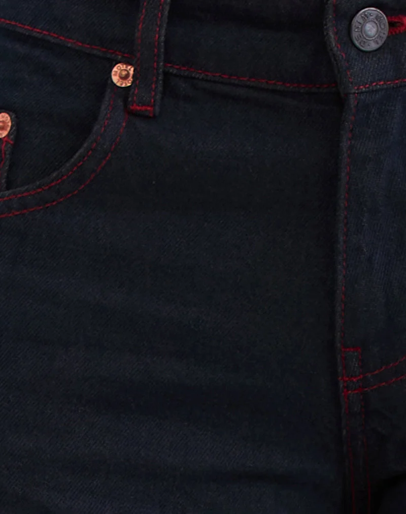 Jean spacieux à taille basse en indigo avec surpiqûres rouges