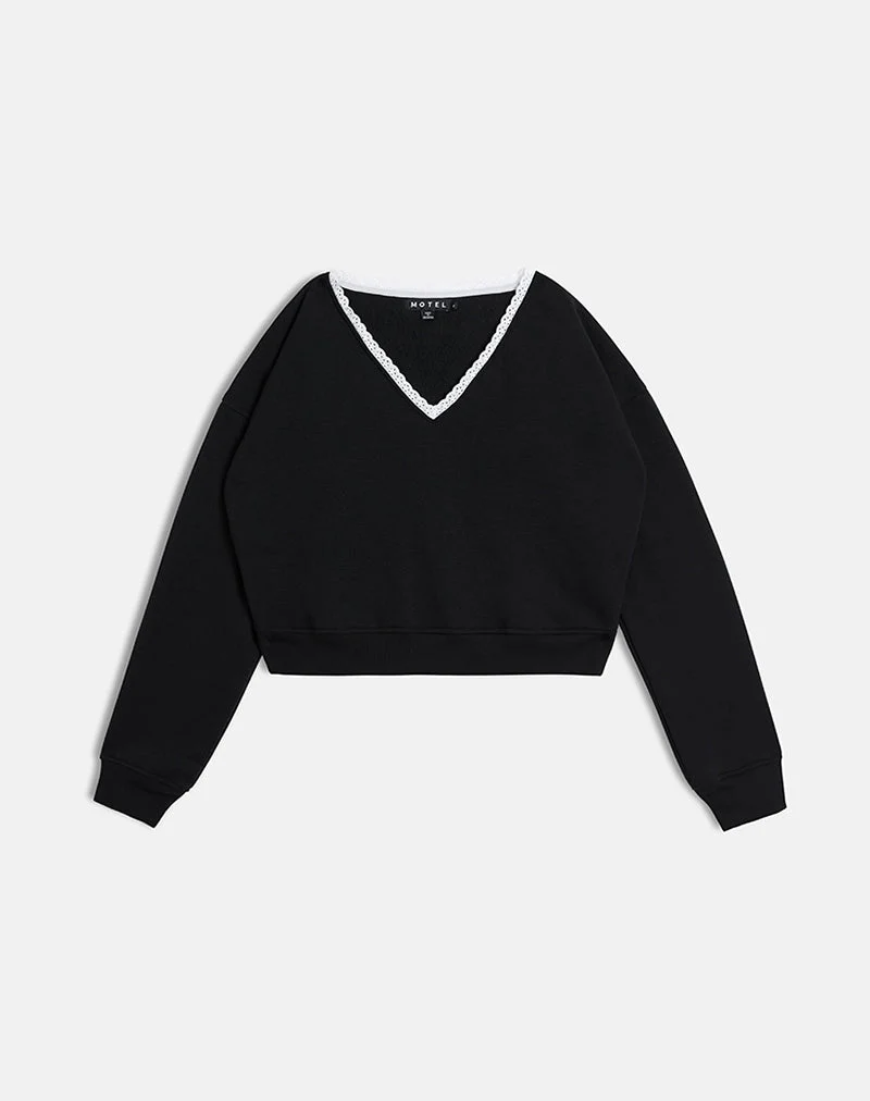Pull Rodyn en noir avec des pointillés blancs