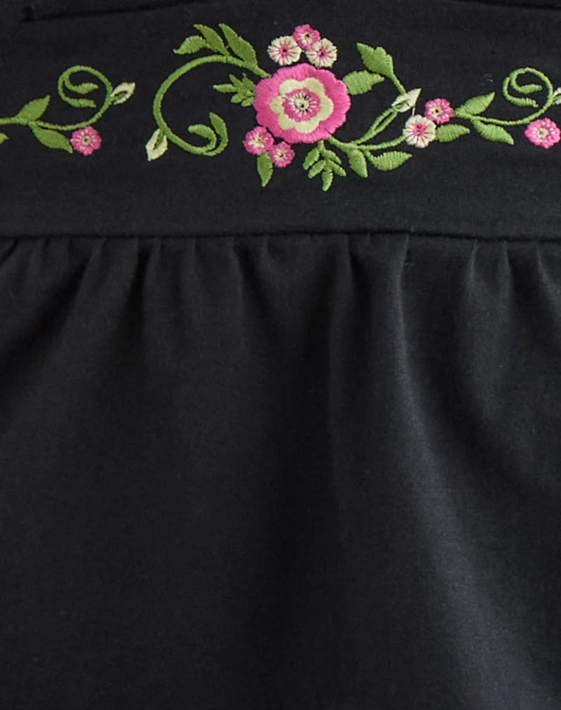 Haut Yahop noir avec broderie florale en spirale