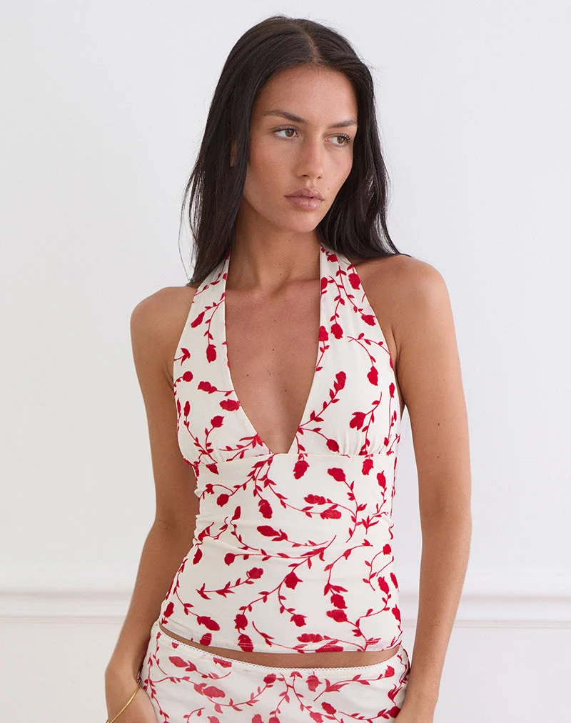 Haut Corsita couleur crème avec motif de lys feuillu rouge en flocage