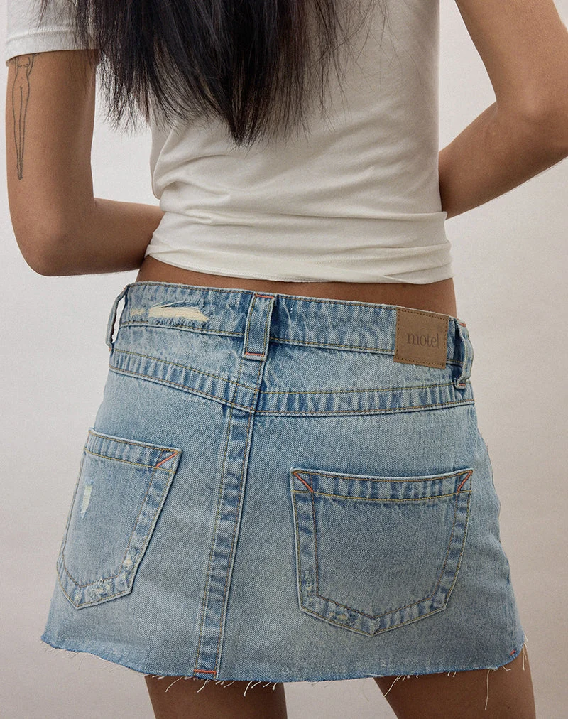 Mini-jupe en jean à ourlet brut déchiré, couleur « True Blue »