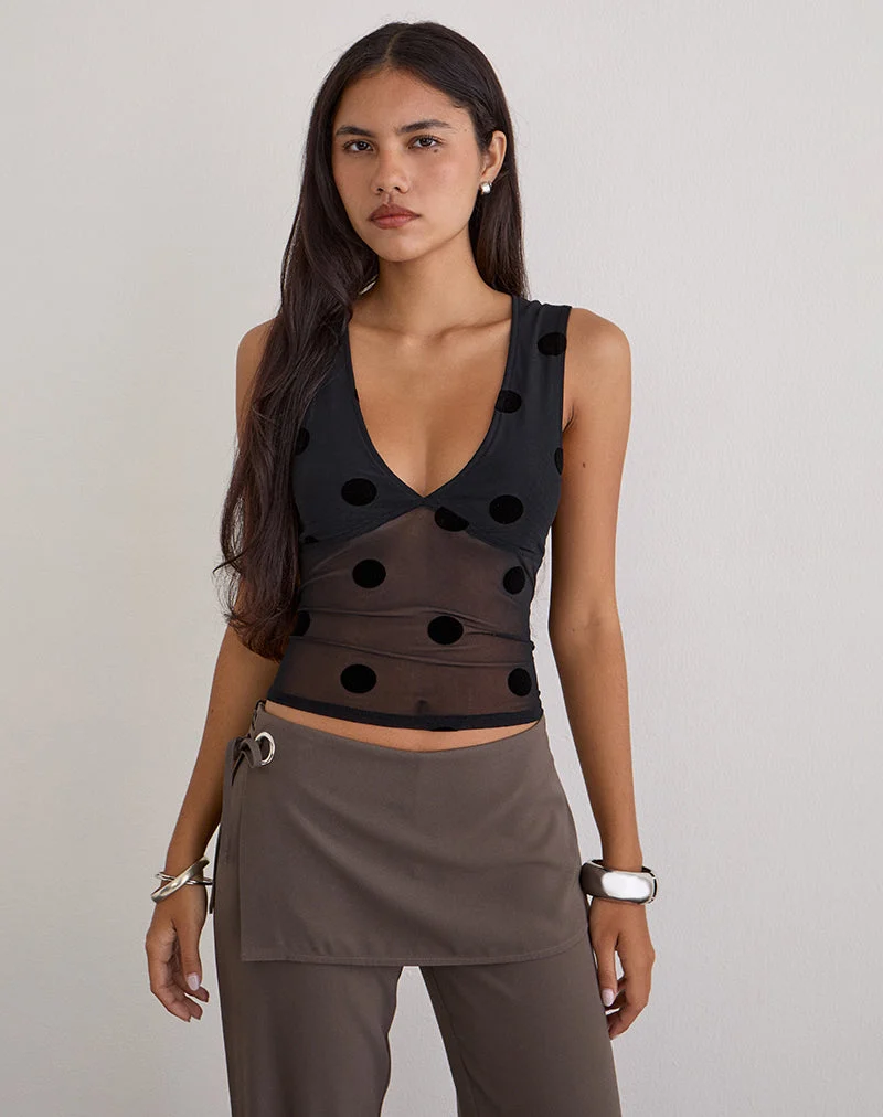 Lihat Top en noir à gros pois