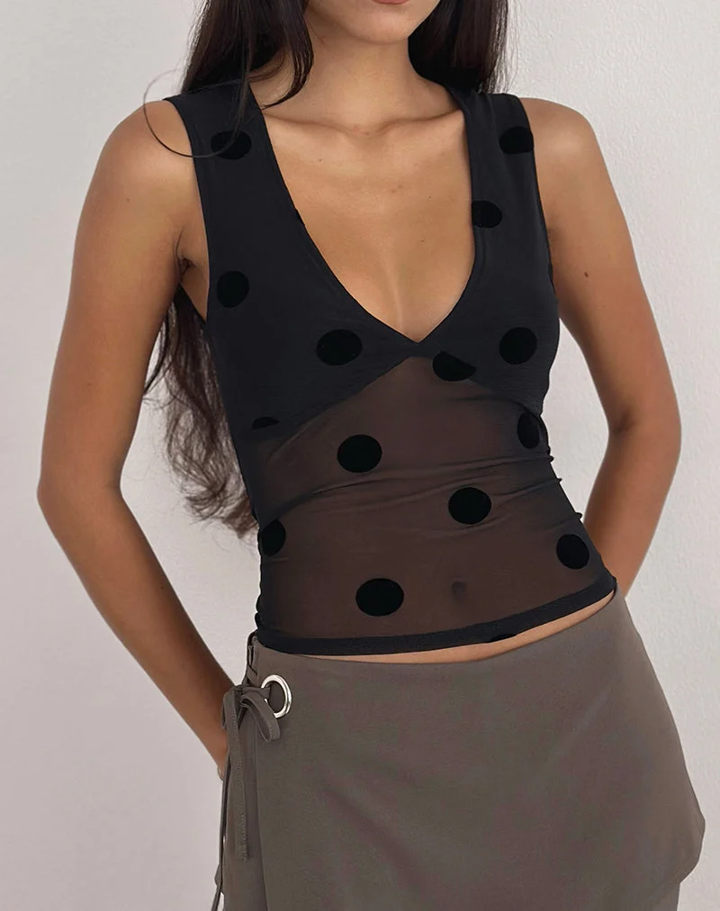 Lihat Top en noir à gros pois
